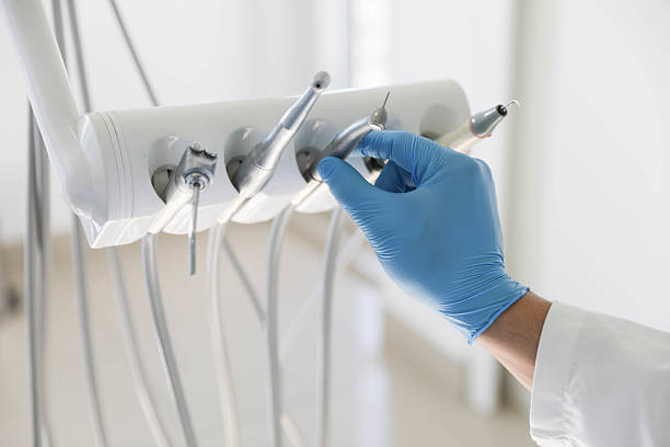 Professional Tooth Extraction technician working in Blue Grass, IA